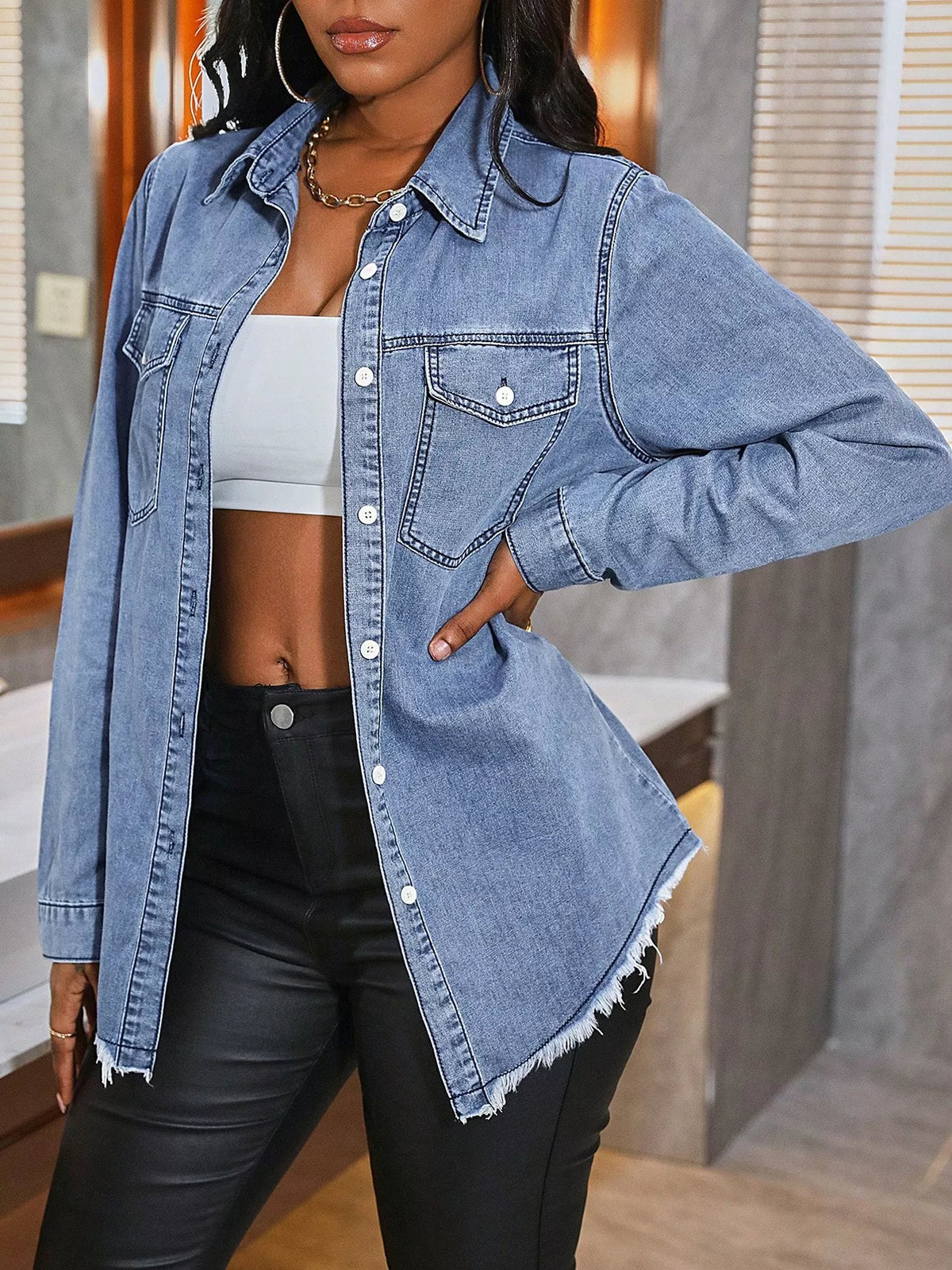 Raw hem button-up denim shirt by Plush Fashion Hub, featuring classic blue denim, button front, and casual style.