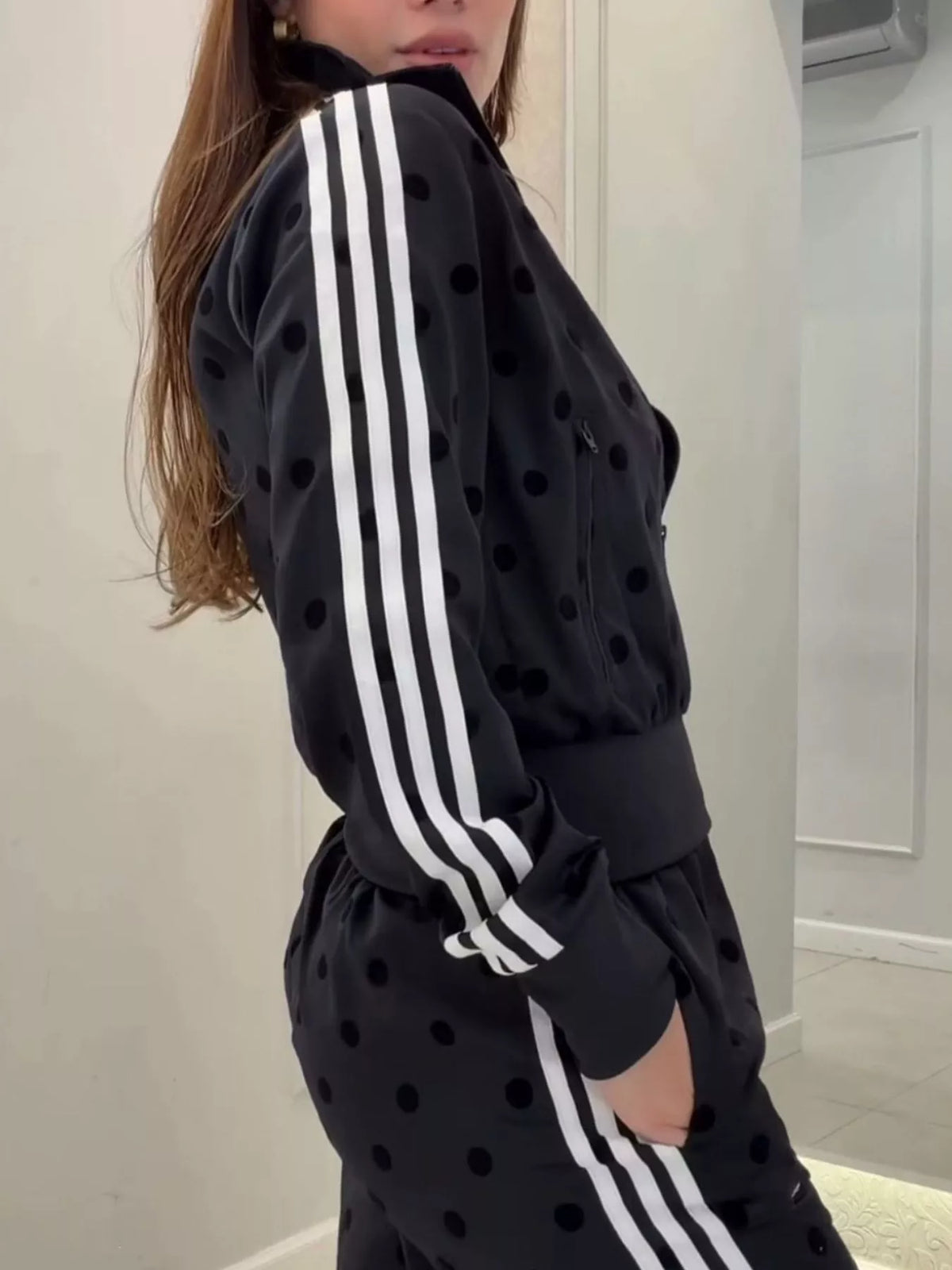 Plush Fashion Hub polka dot zip-up outerwear and pants matching set, featuring a stylish and comfortable coordinated outfit.