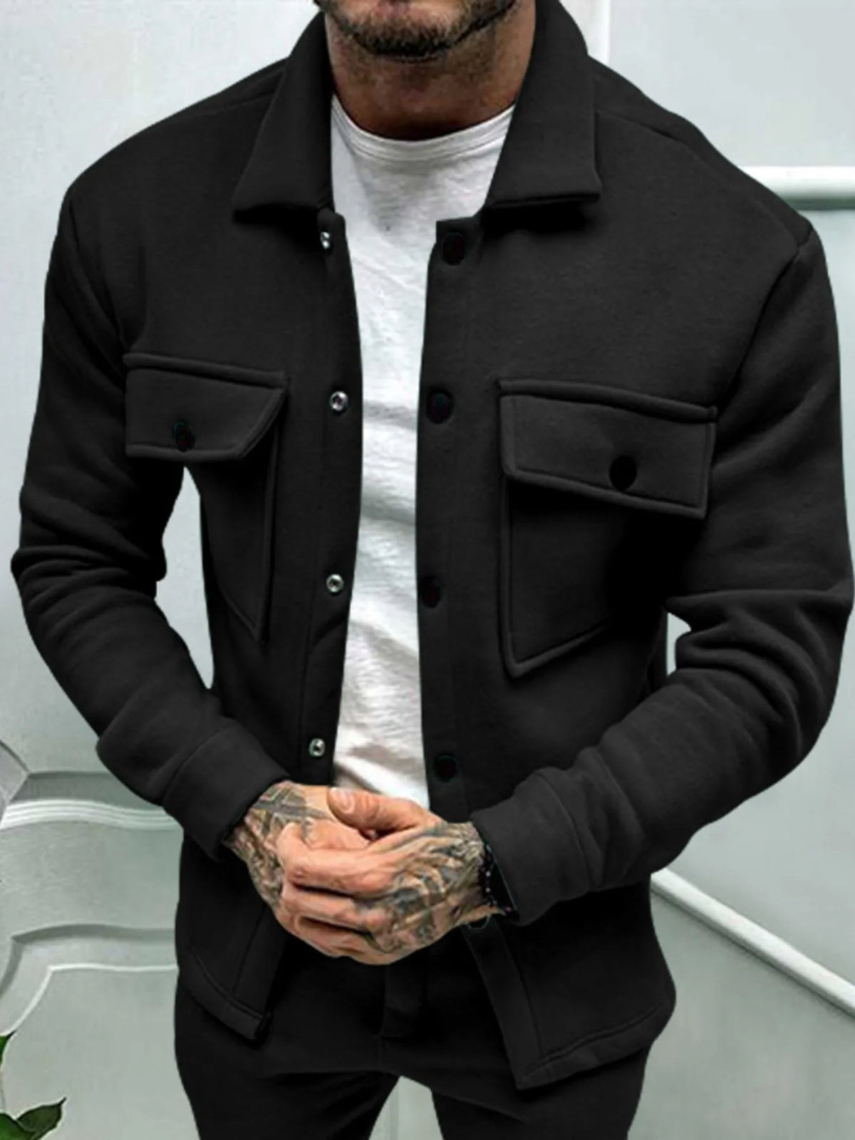 Men's full-size button-up long sleeve jacket by Trendsi, shown in a neutral color, with collar and front button closure.