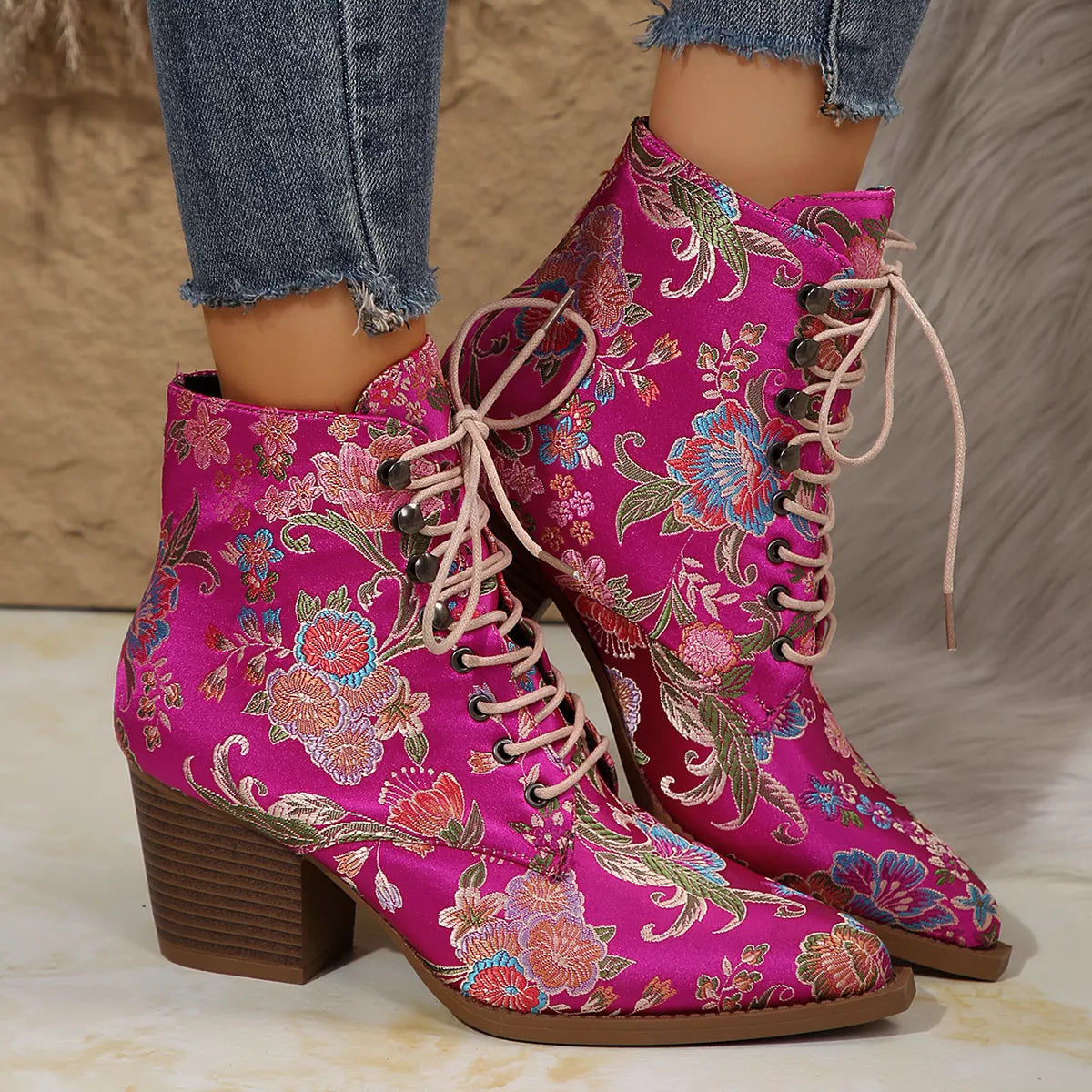 Point toe block heel boots from Trendsi featuring a sleek design, closed toe, and sturdy block heel in stylish footwear.