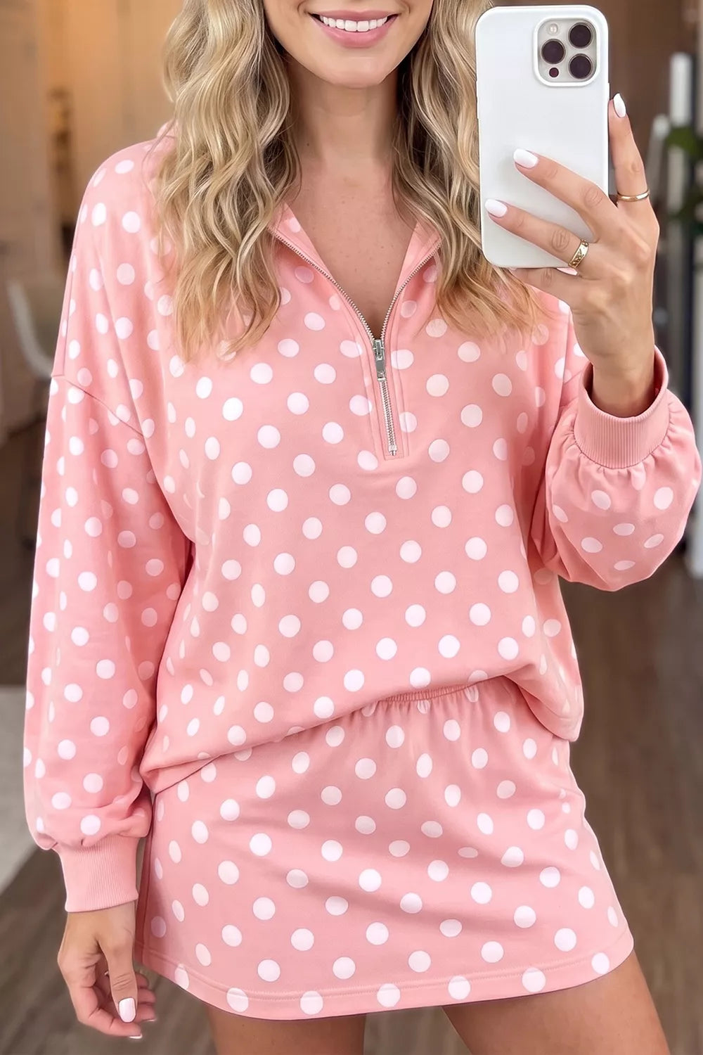 Polka dot quarter zip sweatshirt and shorts set for women by Trendsi, featuring a matching casual loungewear outfit.