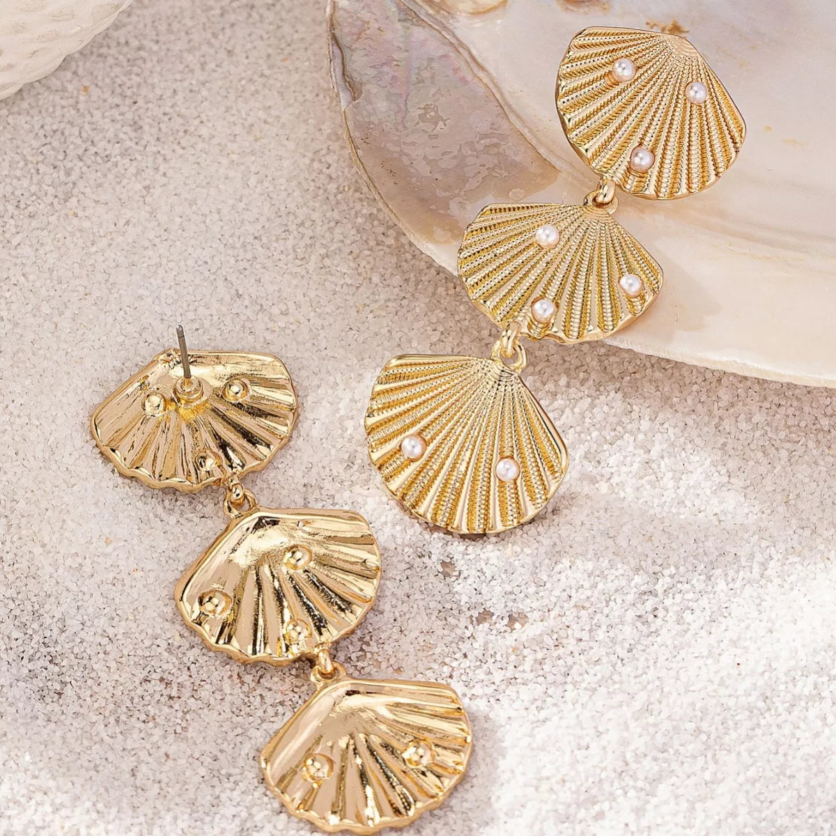 Seashell dangle earrings with pearl accents from Plush Fashion Hub, featuring a delicate and stylish jewelry design.