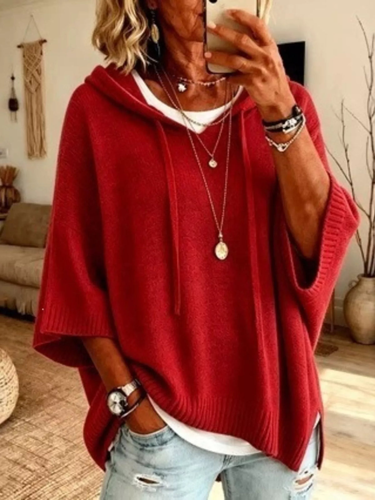 Plus size full-length drawstring hooded sweater with 3/4 sleeves from Trendsi, featuring a comfortable, casual fit.