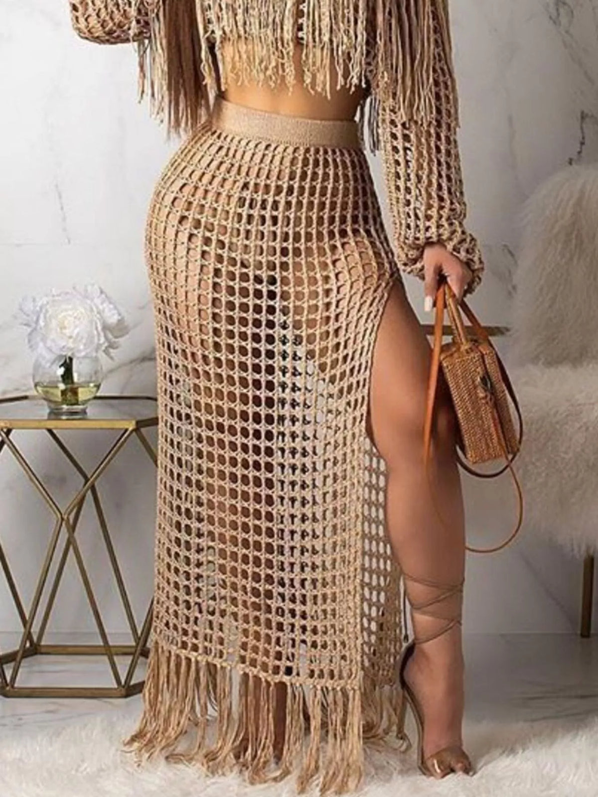 Plus size crochet off-shoulder fringe top and skirt set from Plush Fashion Hub, featuring a matching crochet design and stylish off-shoulder style.