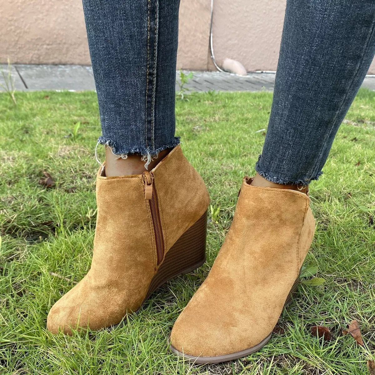 Round toe wedge ankle boots from Trendsi, showcasing stylish footwear with a comfortable ankle-height design.