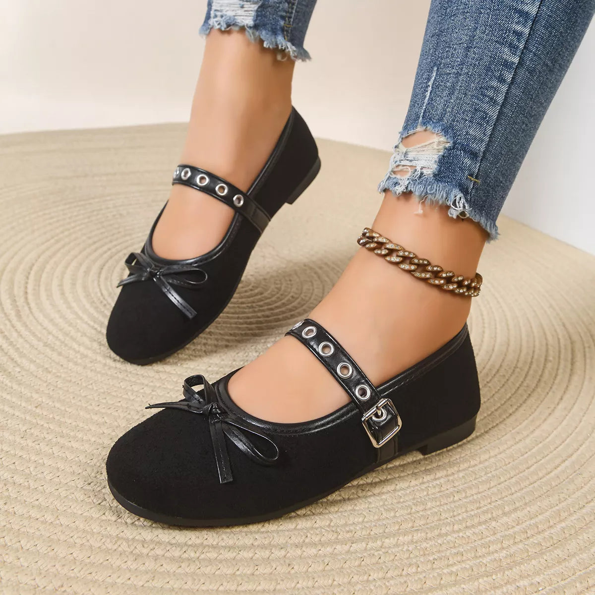 Round toe bow slip-on footwear by Trendsi featuring a sleek design and comfortable fit, shown in the product image.