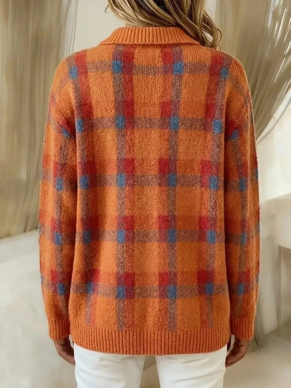Plaid button-up cardigan from Trendsi featuring a cozy knit design in classic plaid pattern.