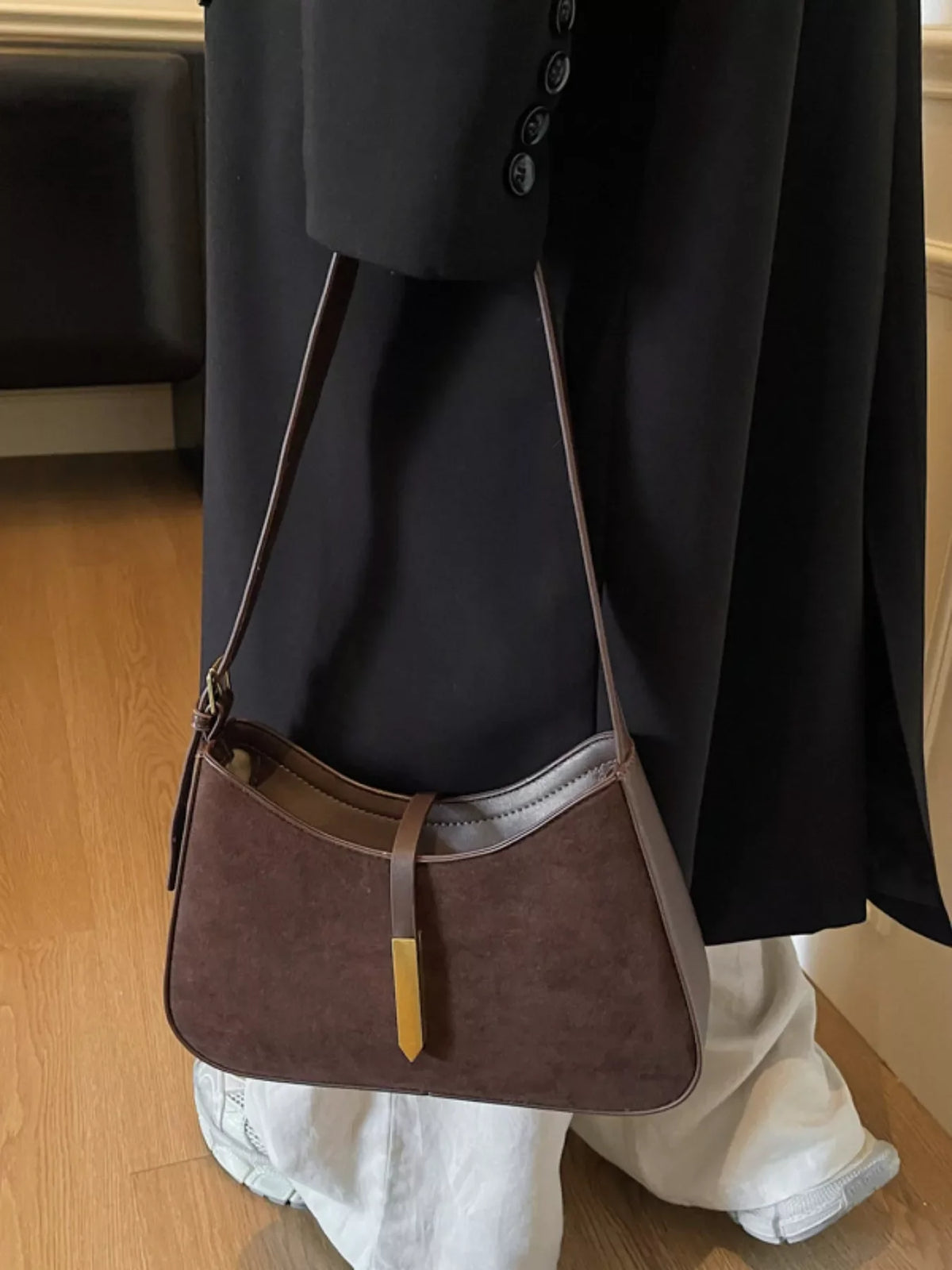 Adjustable strap shoulder bag from Plush Fashion Hub featuring a stylish design with a spacious interior and versatile carry options.