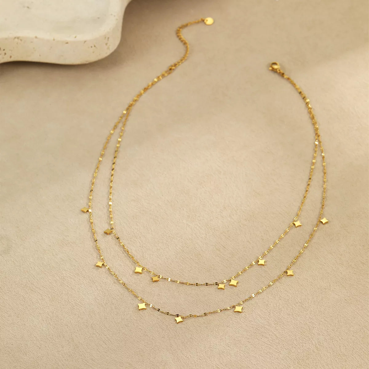 18K gold plated layered star charm necklace with multiple star pendants, stylish jewelry by Plush Fashion Hub.