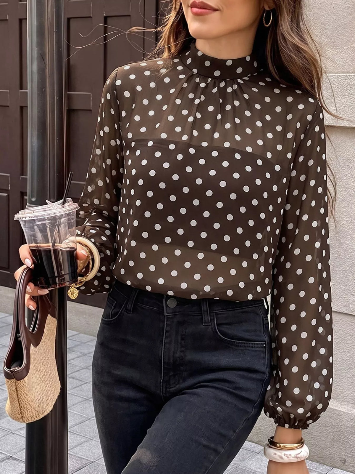 Polka dot mock neck long sleeve blouse by Trendsi, featuring a stylish pattern and a classic fit.