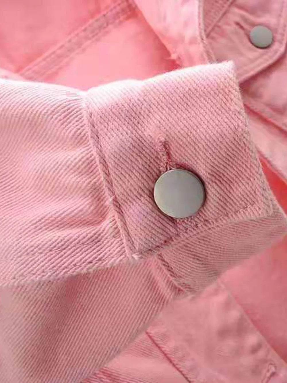 Plus size full-length cropped denim jacket from Trendsi, showing classic blue denim with button closure and stylish fit.