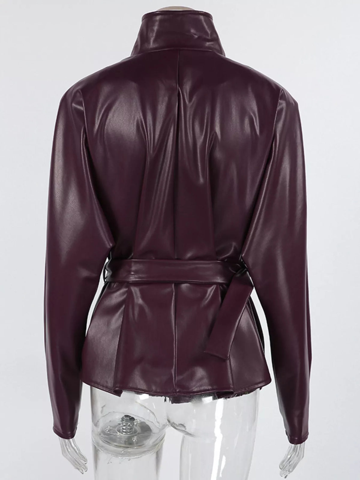 Women's faux leather jacket with stand collar and belt, stylish Trendsi jacket featuring sleek design and modern details.