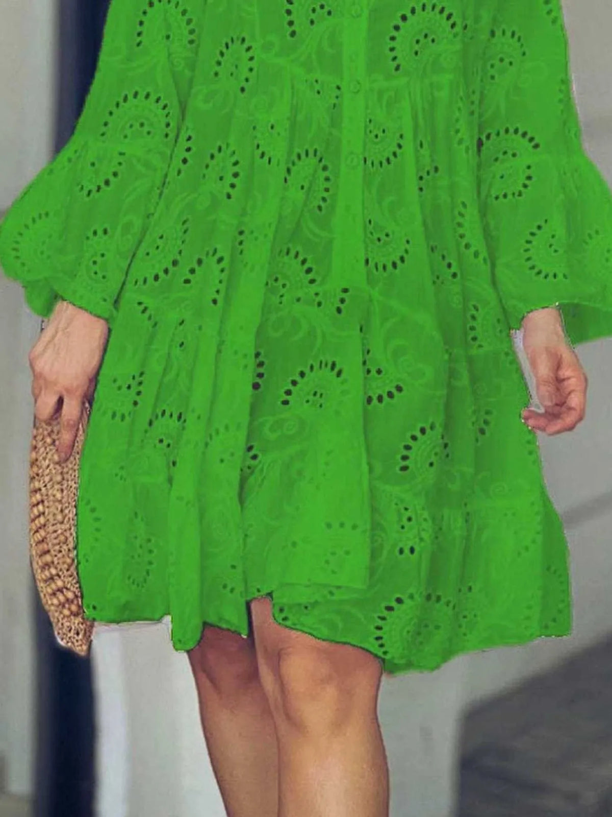 Plus size ruffled hem tiered dress with eyelet details, featuring a full-size fit and trendy design by Trendsi.