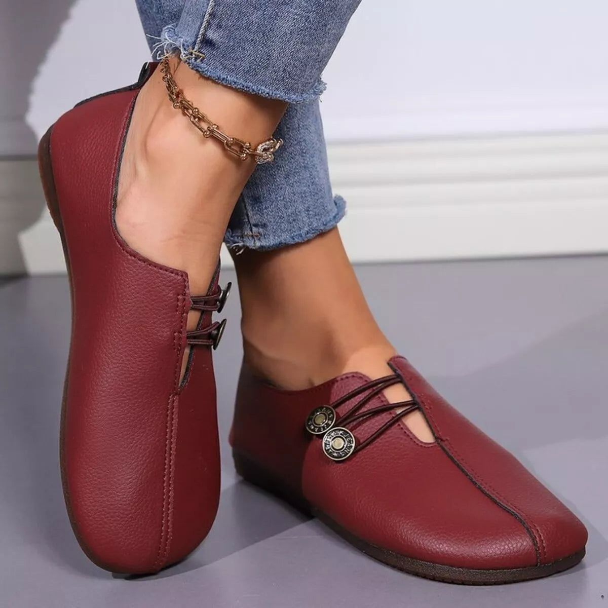 Women's Casual Button Detail Slip-On Shoes by Trendsi, featuring a comfortable design with stylish button accents and smooth slip-on style.