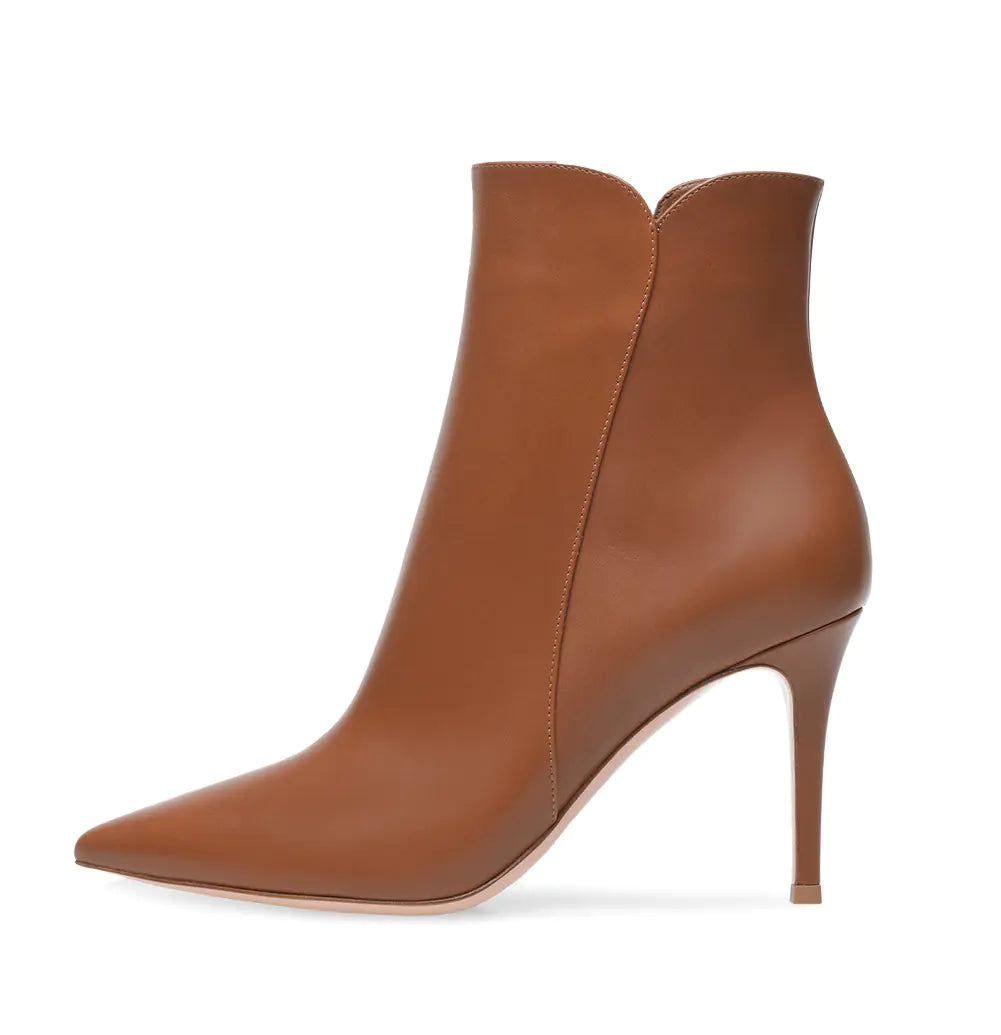 Women's black pointed toe ankle boots with super high heels by Trendy Attic Store01, stylish and sleek for fashionable wear.