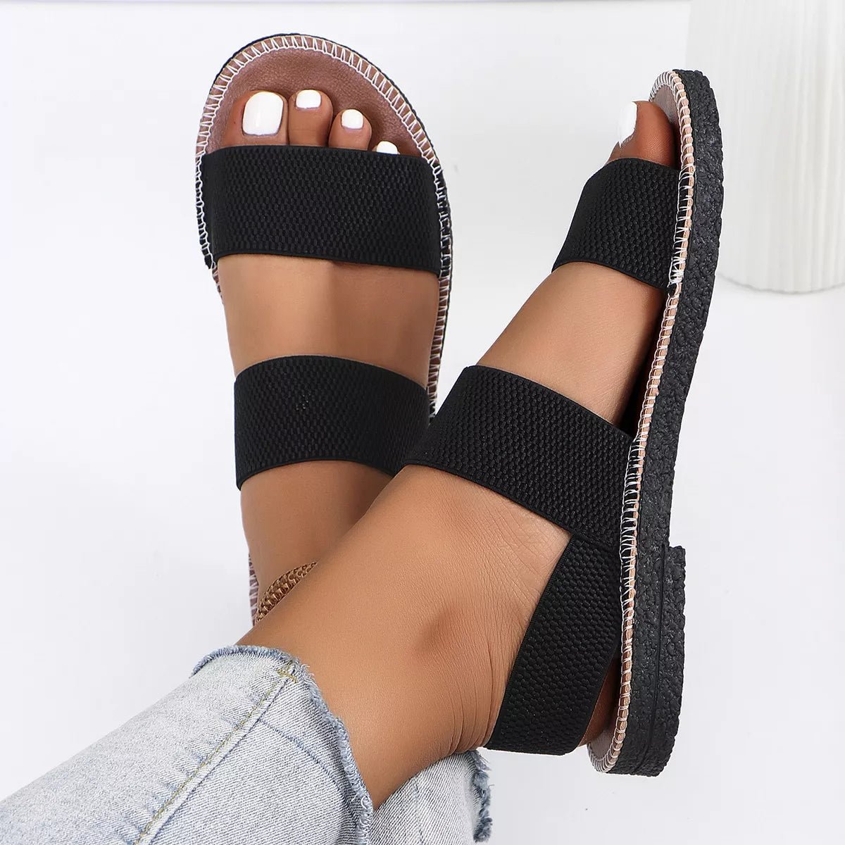 Women's elastic band open toe flat sandals by Plush Fashion Hub, featuring a stylish open toe design and comfortable flat sole.