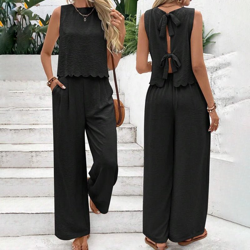 Elegant FitiqueFit 2-piece matching casualwear set with a sleeveless crop top and wide-leg pants, perfect for stylish comfort.