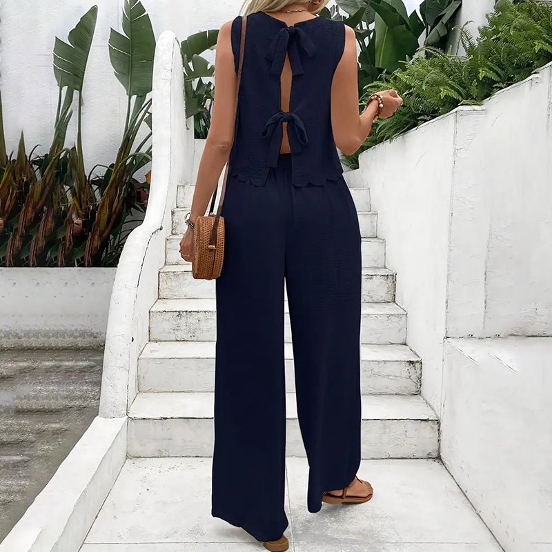 Elegant FitiqueFit 2-piece matching set with a sleeveless crop top and wide-leg pants, perfect casualwear for stylish comfort.