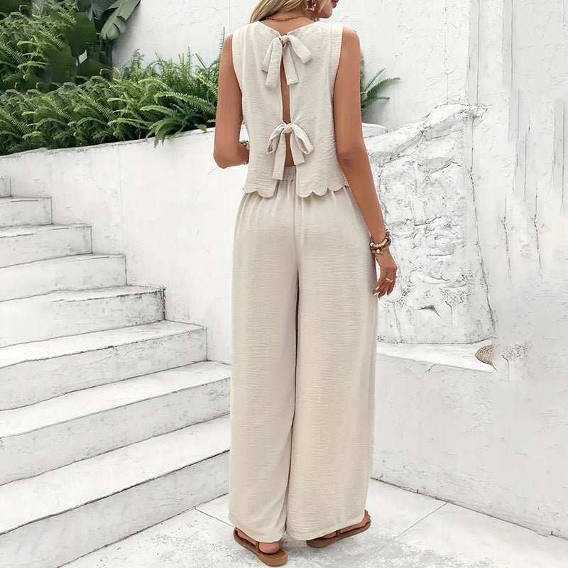 Elegant FitiqueFit 2-piece casualwear set with a sleeveless crop top and wide-leg pants, perfect for stylish everyday wear.