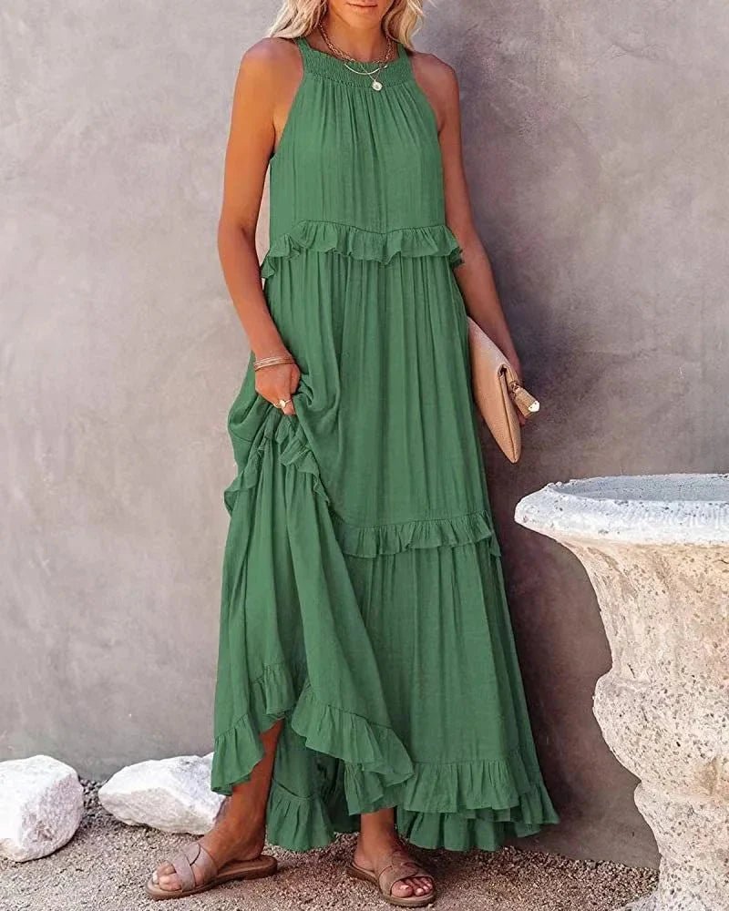 Elegant apricot ruffle maxi dress by FitiqueFit, showcasing flowy fabric and stylish ruffle details for casual wear.