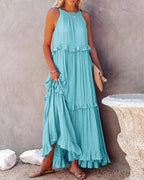 Elegant apricot ruffle maxi dress by FitiqueFit, flowing casualwear with layered ruffle details and a comfortable fit.
