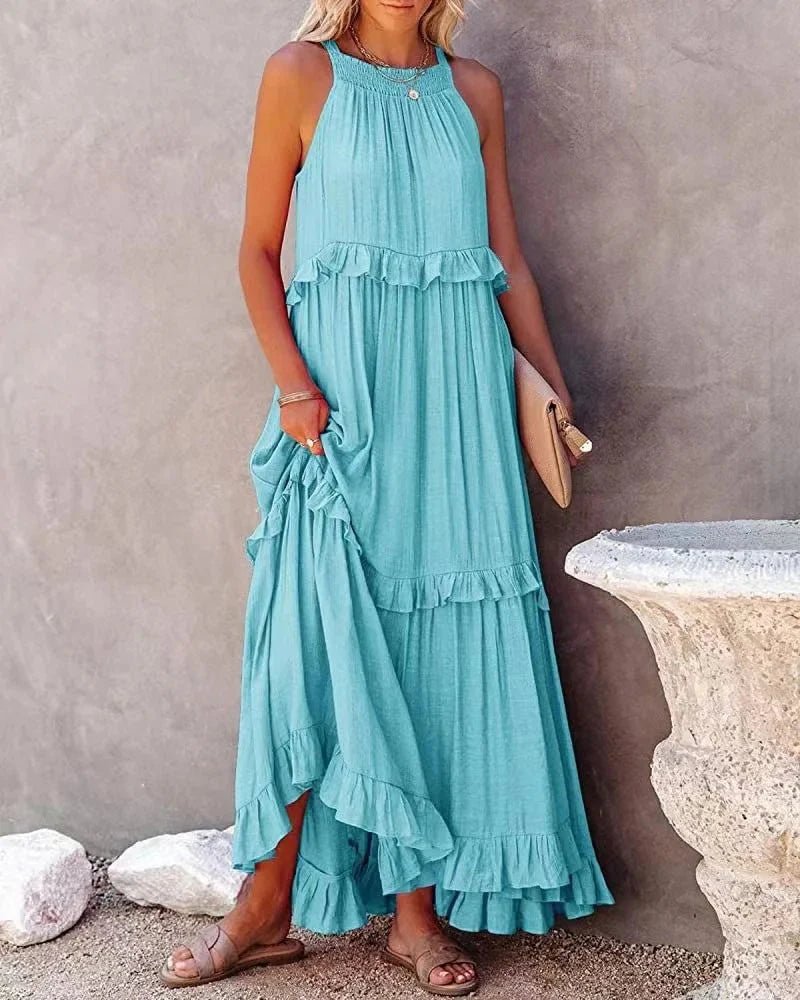 Elegant apricot ruffle maxi dress by FitiqueFit, flowing casualwear with layered ruffle details and a comfortable fit.