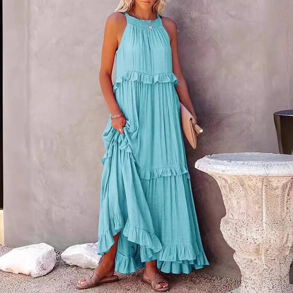 Elegant apricot ruffle maxi dress by FitiqueFit, featuring flowing fabric, ruffled details, and a casual stylish design.