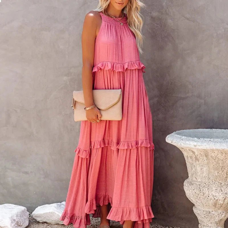 Elegant apricot ruffle maxi dress by FitiqueFit, featuring flowing fabric and stylish ruffle details for casualwear occasions.