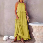 Elegant apricot ruffle maxi dress by FitiqueFit, featuring flowing fabric and stylish ruffle details for casual wear.