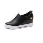 Elevated slip-on women's shoes with thick soles, featuring a stylish design and comfortable fit by LadyShow.Store.