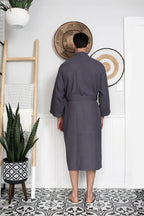 Lotus Linen men's waffle spa bathrobe with embroidery, lightweight and absorbent, perfect for comfortable post-shower relaxation.