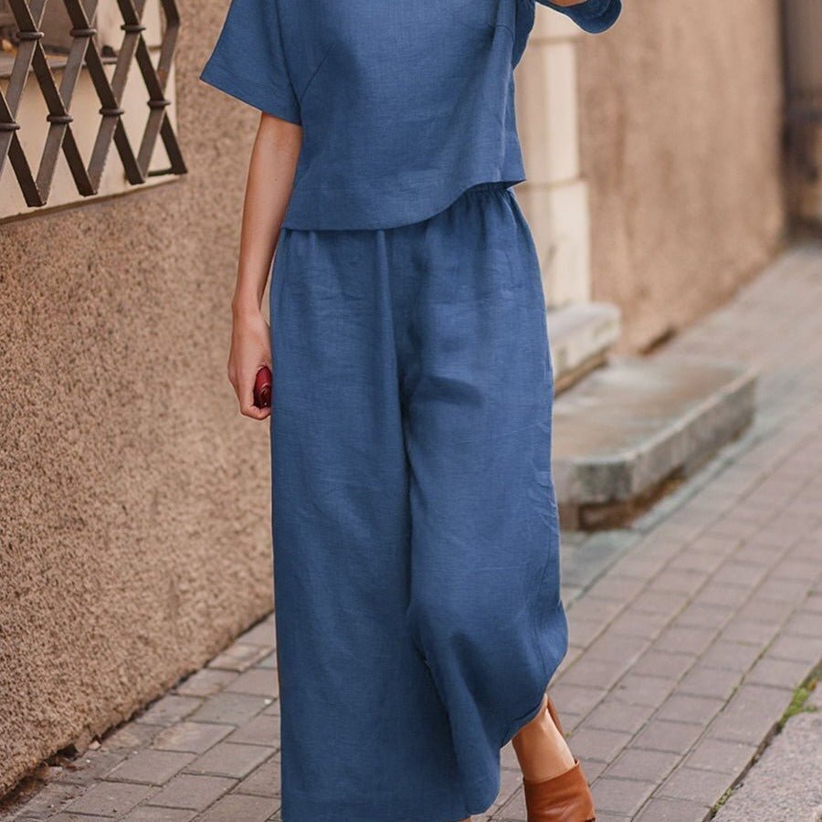 European and American women's linen casual two-piece suit with loose fit and solid color, featuring a stylish top.