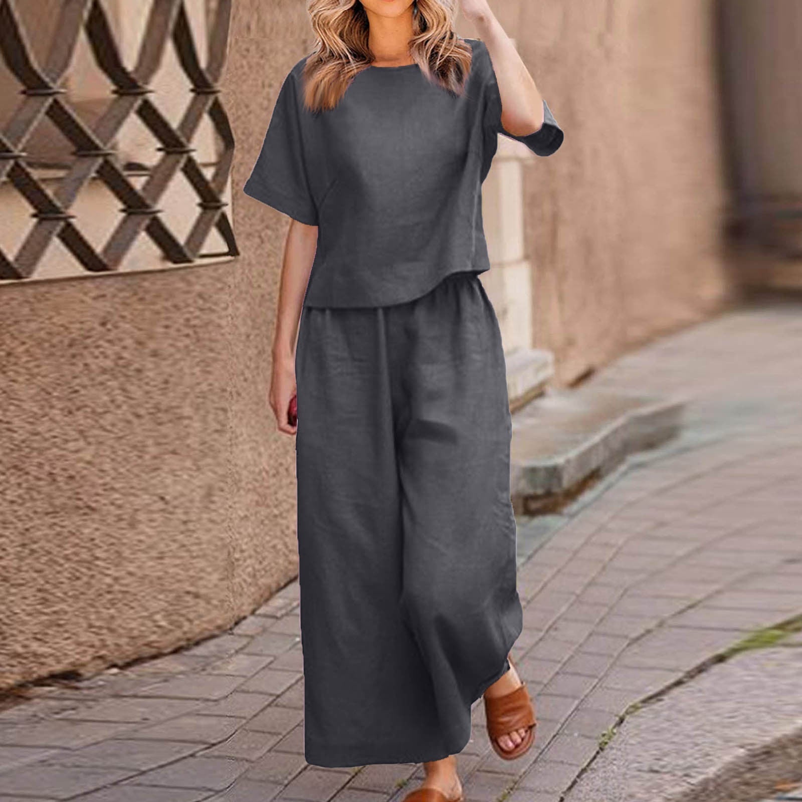 European and American women's linen casual two-piece suit with a loose fit, featuring solid color tops and comfortable style.