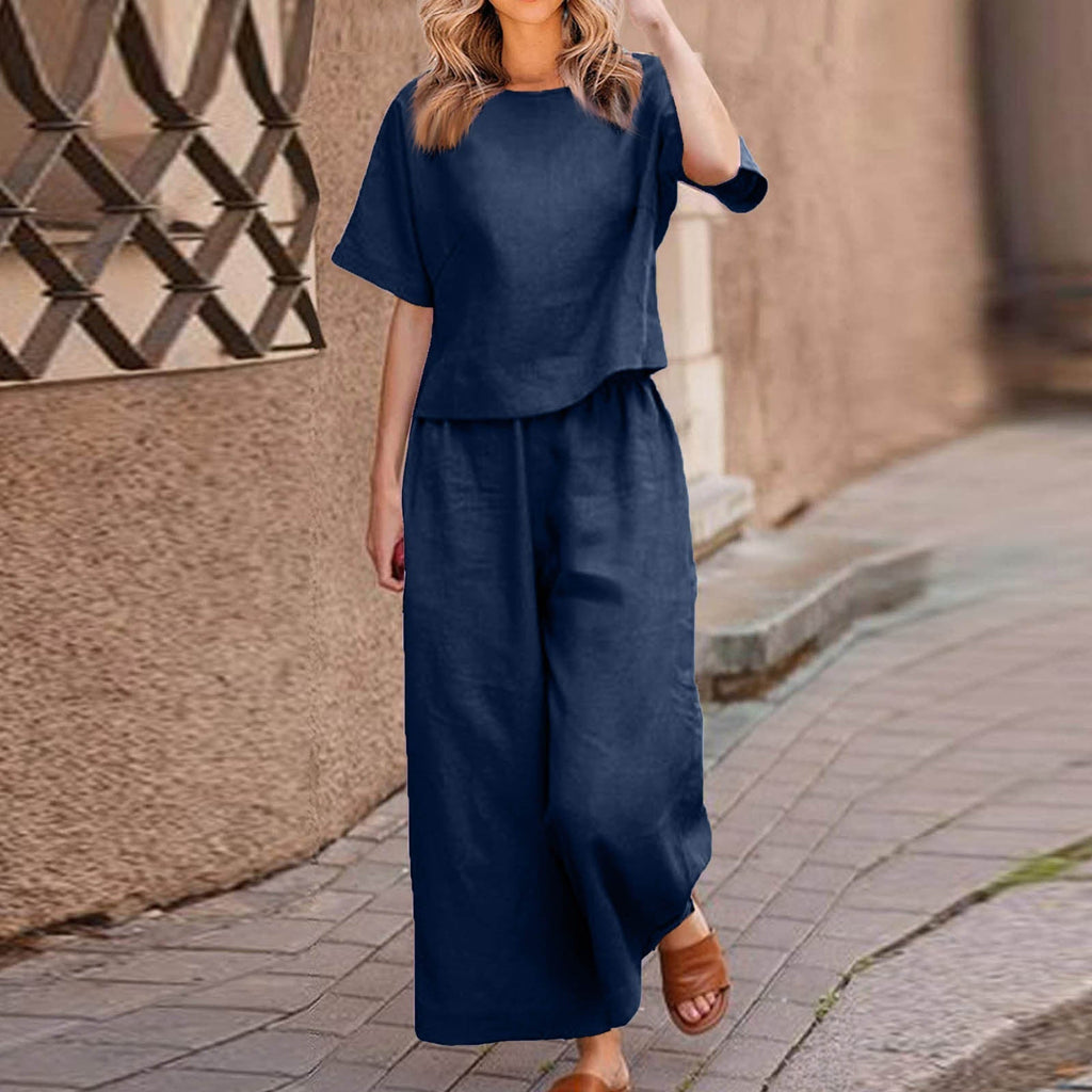 European and American women's linen two-piece casual suit, featuring a loose-fit solid color top and matching bottoms.