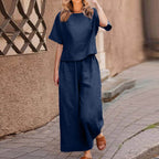 European and American women's linen two-piece casual suit, featuring a loose-fit solid color top and matching bottoms.
