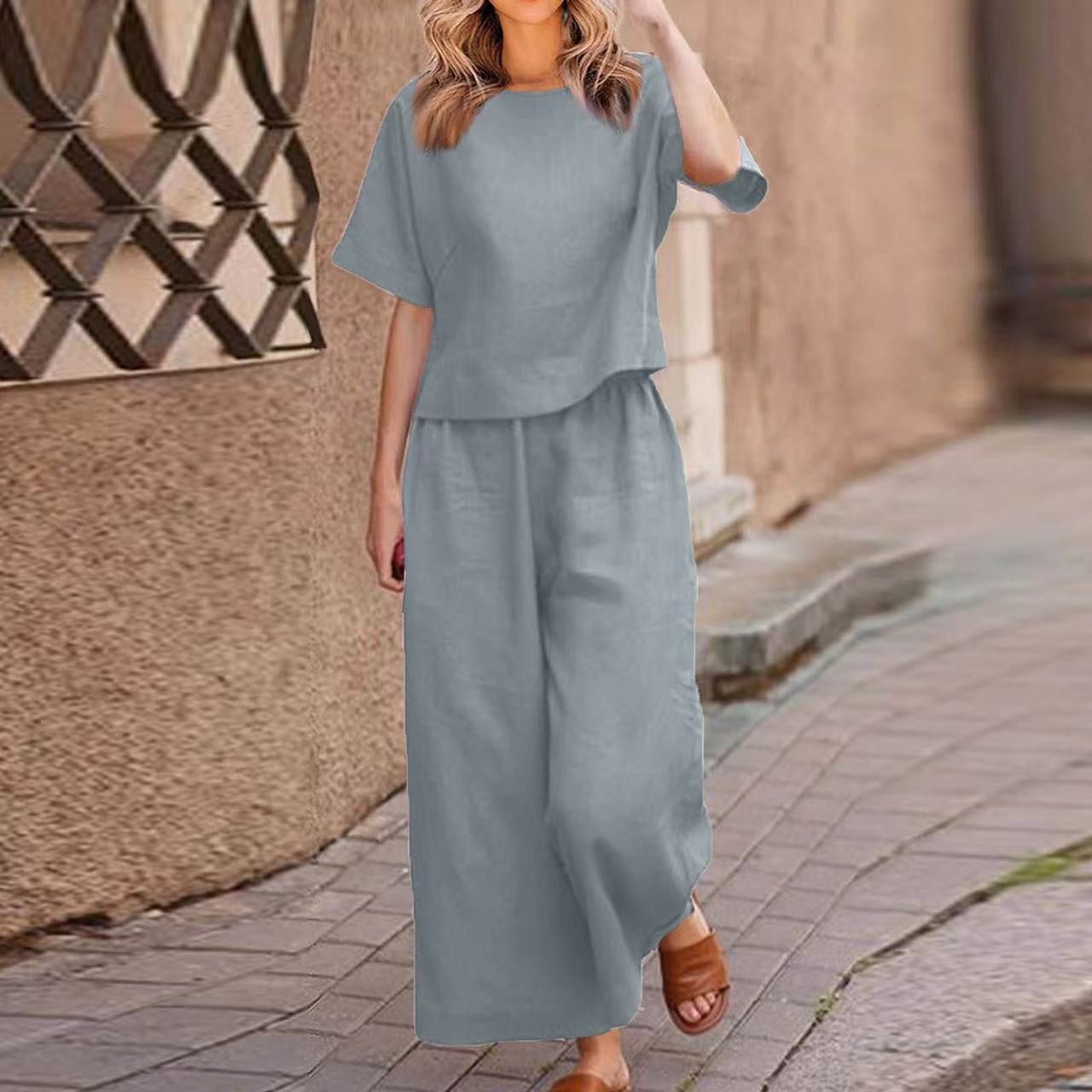 European and American women's linen two-piece suit with casual loose fit, featuring solid color tops and stylish design.