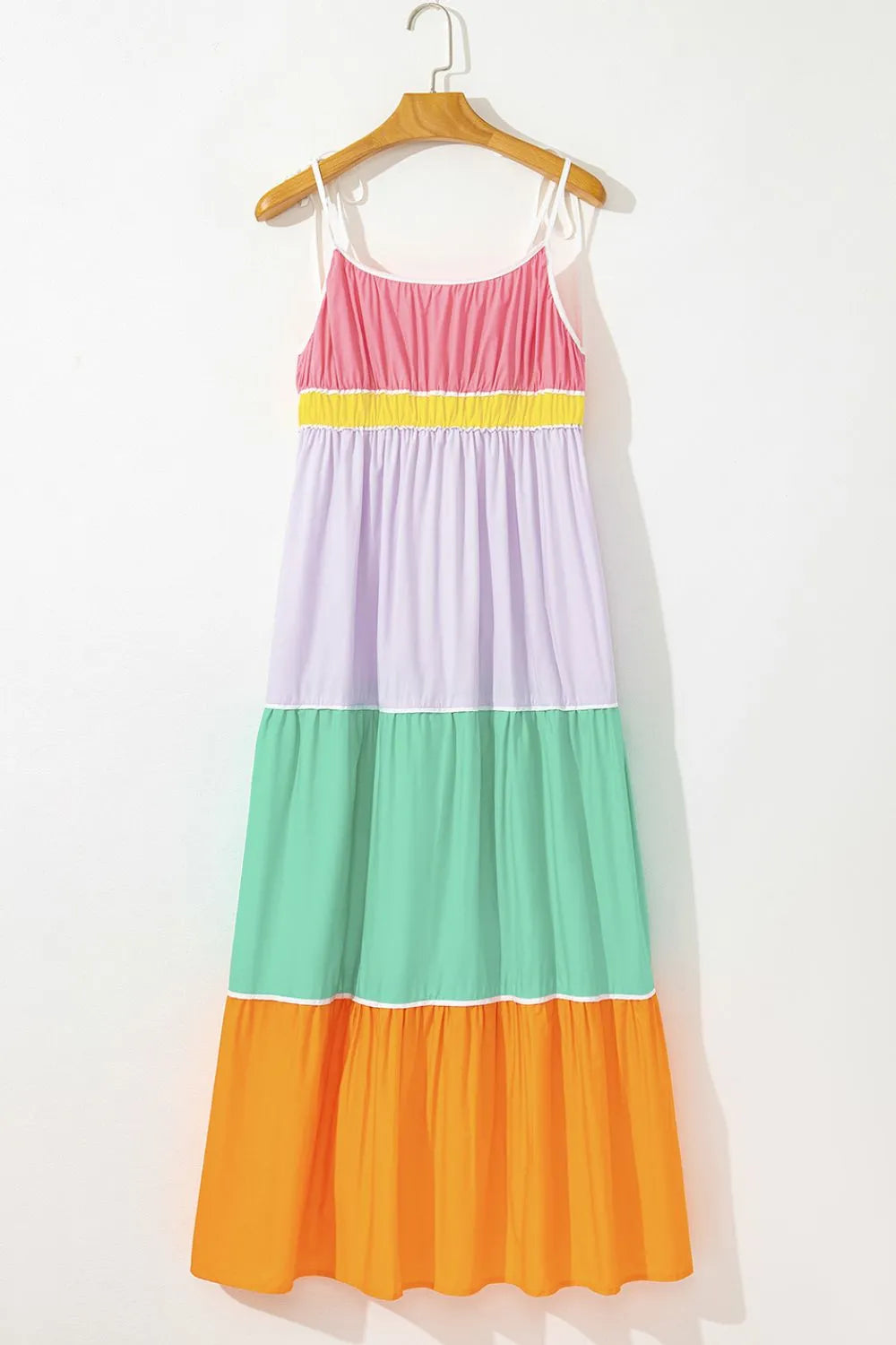 Women's 100% cotton color block tiered maxi dress with pockets, featuring a vibrant design and flowing silhouette.