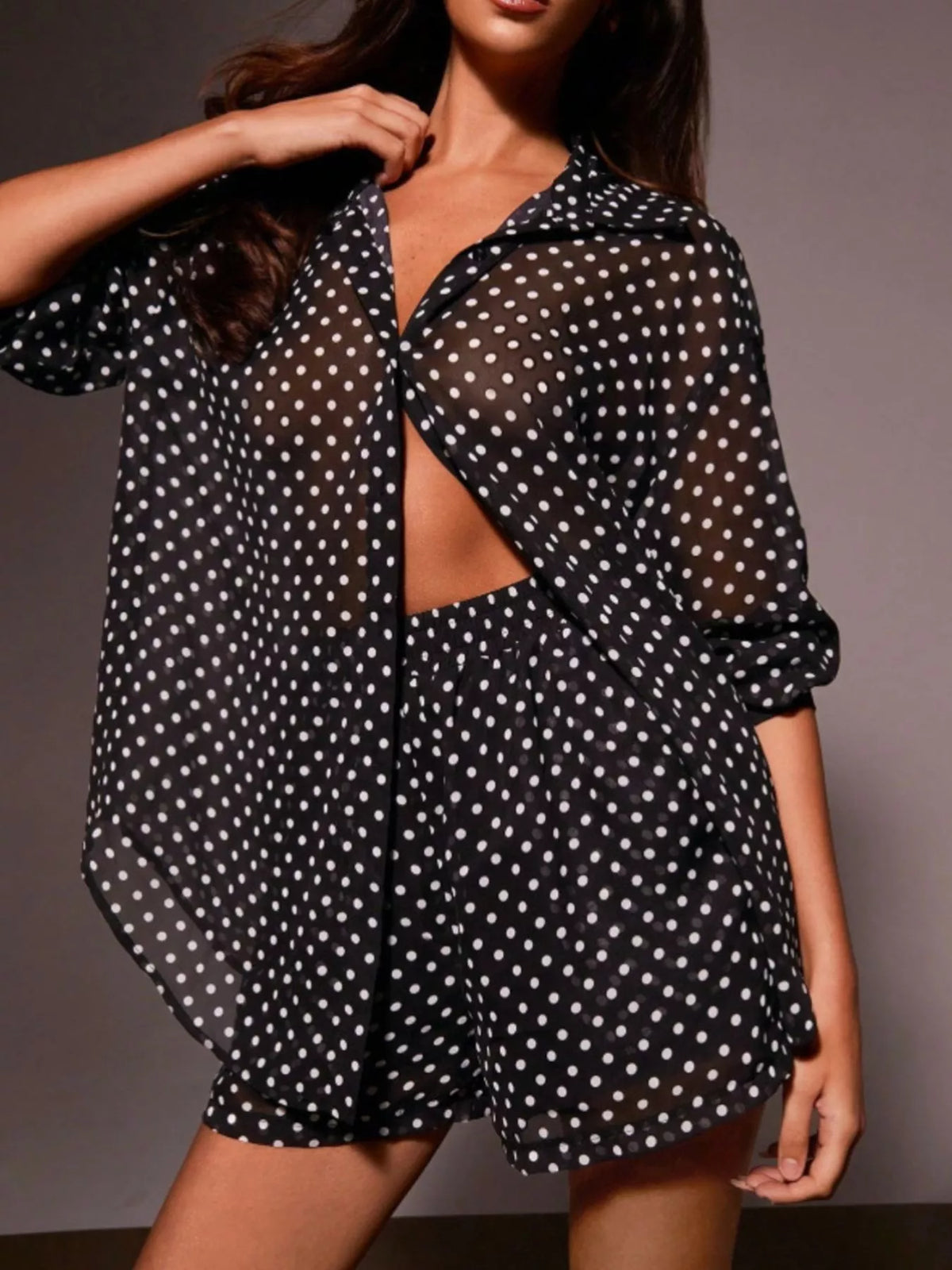 Polka dot button-up loungewear set from Plush Fashion Hub featuring a shirt and shorts for casual comfort.