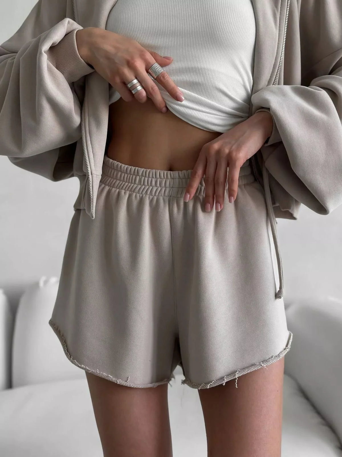 Plush Fashion Hub zip-up long sleeve outerwear and matching shorts set, casual and comfortable for everyday wear.