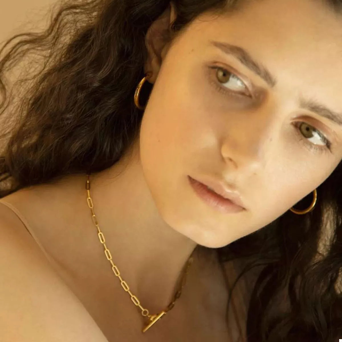 Gold-plated chain link toggle clasp necklace from Plush Fashion Hub, showcasing a stylish and elegant jewelry piece.
