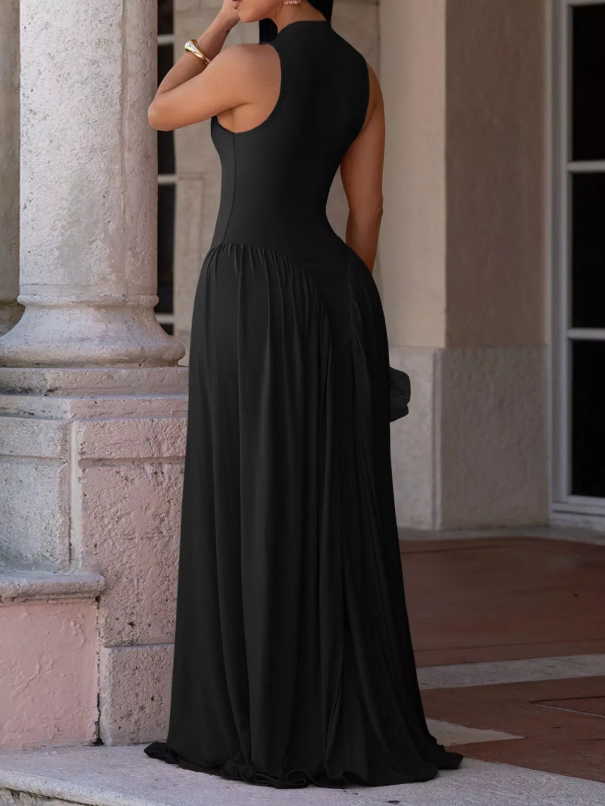 Sleeveless O-neck maxi dress by Plush Fashion Hub featuring a flowing silhouette and lightweight fabric, perfect for summer wear.