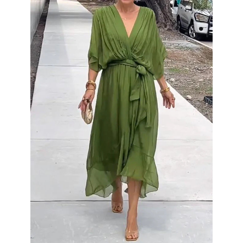 Plush Fashion Hub batwing sleeve V-neck midi dress with tied irregular hem, flowing fairy-style dress in lightweight fabric.