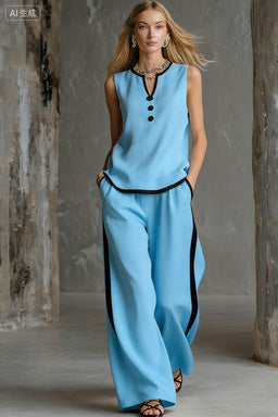 Women's minimalist sleeveless two-piece casualwear set by FitiqueFit, featuring a simple top and matching skirt or pants.