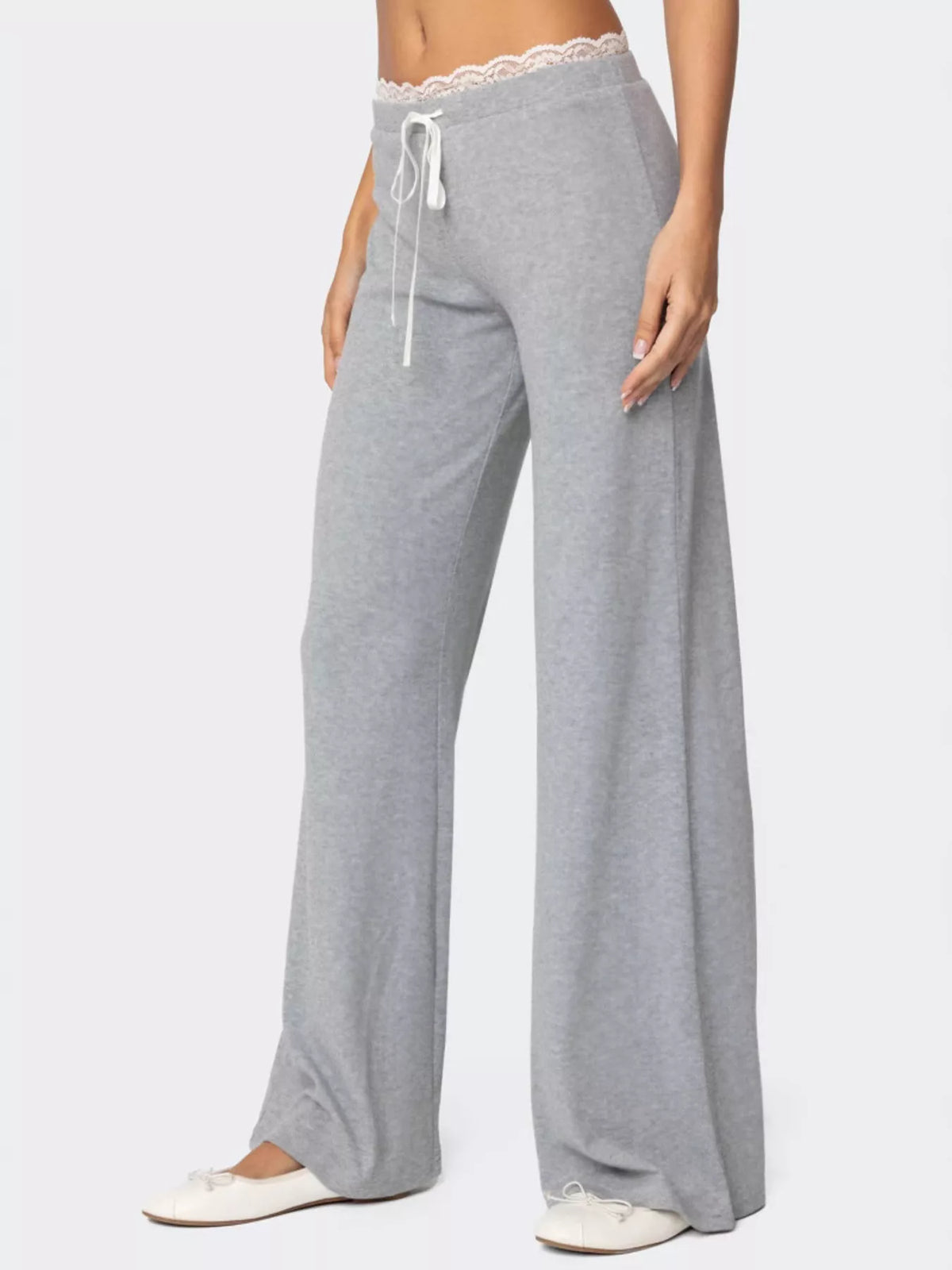 Women's elegant wide leg lounge pants from Plush Fashion Hub with lace trim and a tie waist, shown in a relaxed, stylish fit.