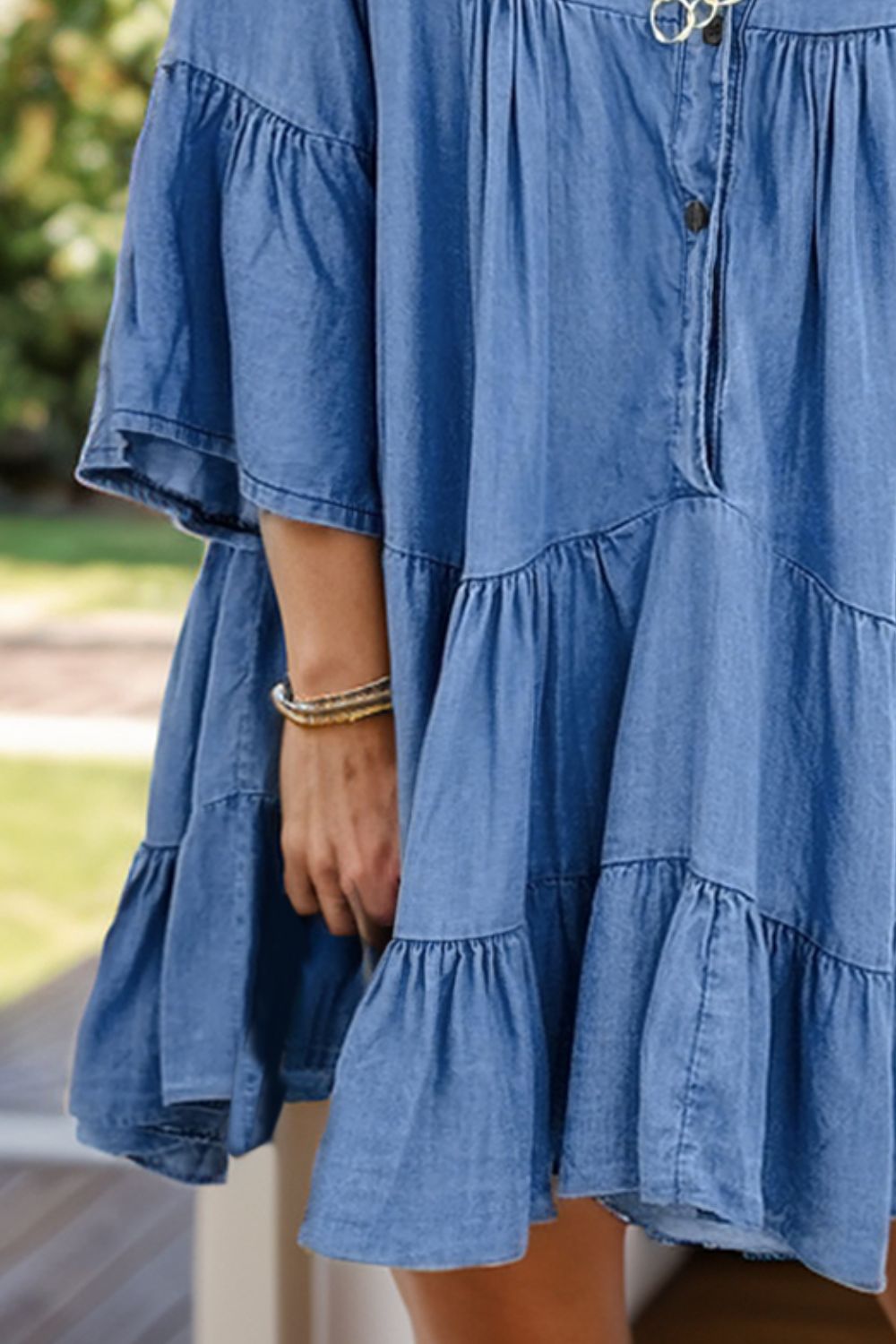 Notched flare sleeve denim dress by Plush Fashion Hub showing a stylish blue denim dress with flare sleeves and notch details.