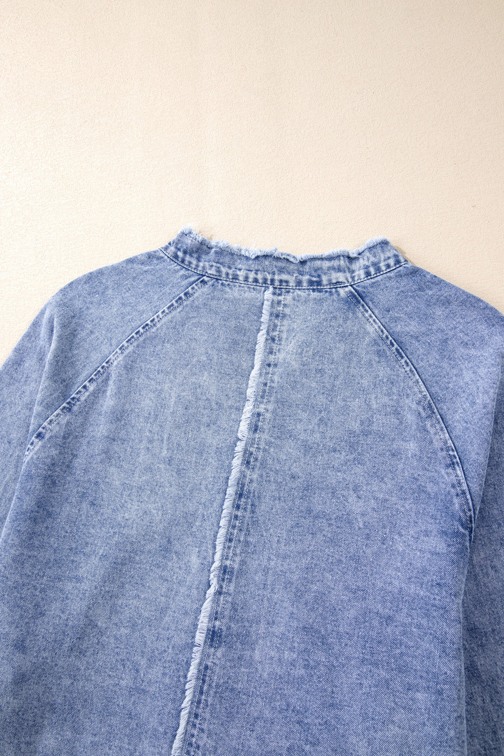 Raw hem button-down long sleeve denim dress by Plush Fashion Hub featuring a casual fit and classic denim fabric.