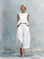 Women's linen-blend sleeveless two-piece set with ruffled detailing from Plush Fashion Hub, featuring a stylish and comfortable design.