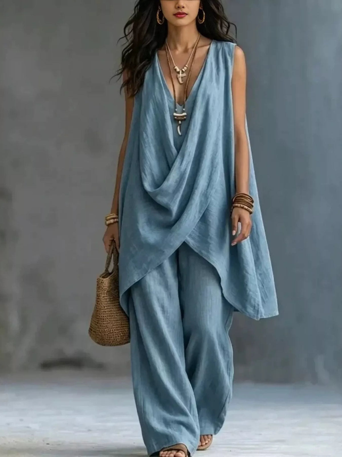 Plush Fashion Hub sleeveless asymmetrical top with wide-leg pants set, stylish and modern fashion outfit for women.