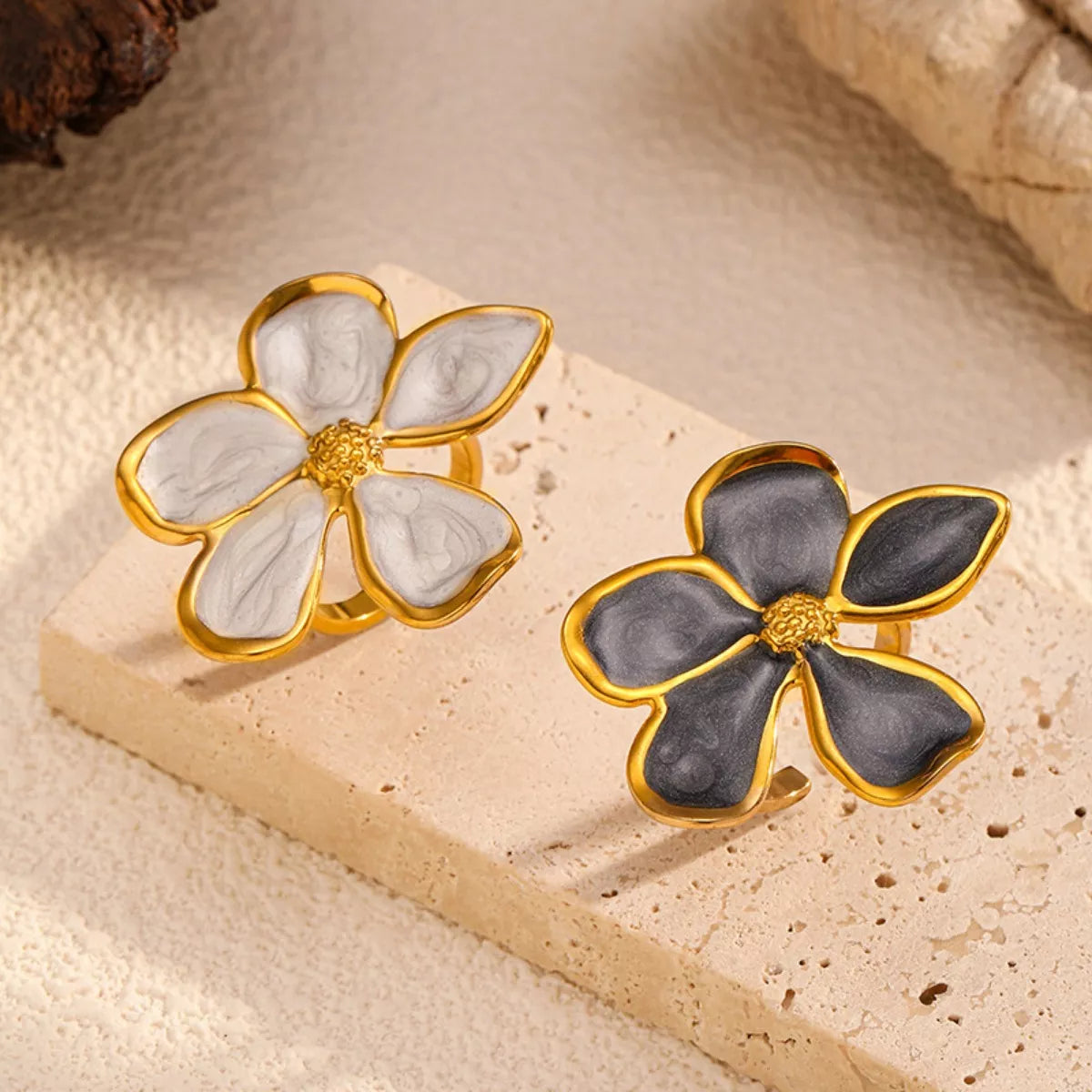 Plush Fashion Hub flower open ring featuring a delicate floral design, silver-tone metal, and adjustable band for stylish wear.