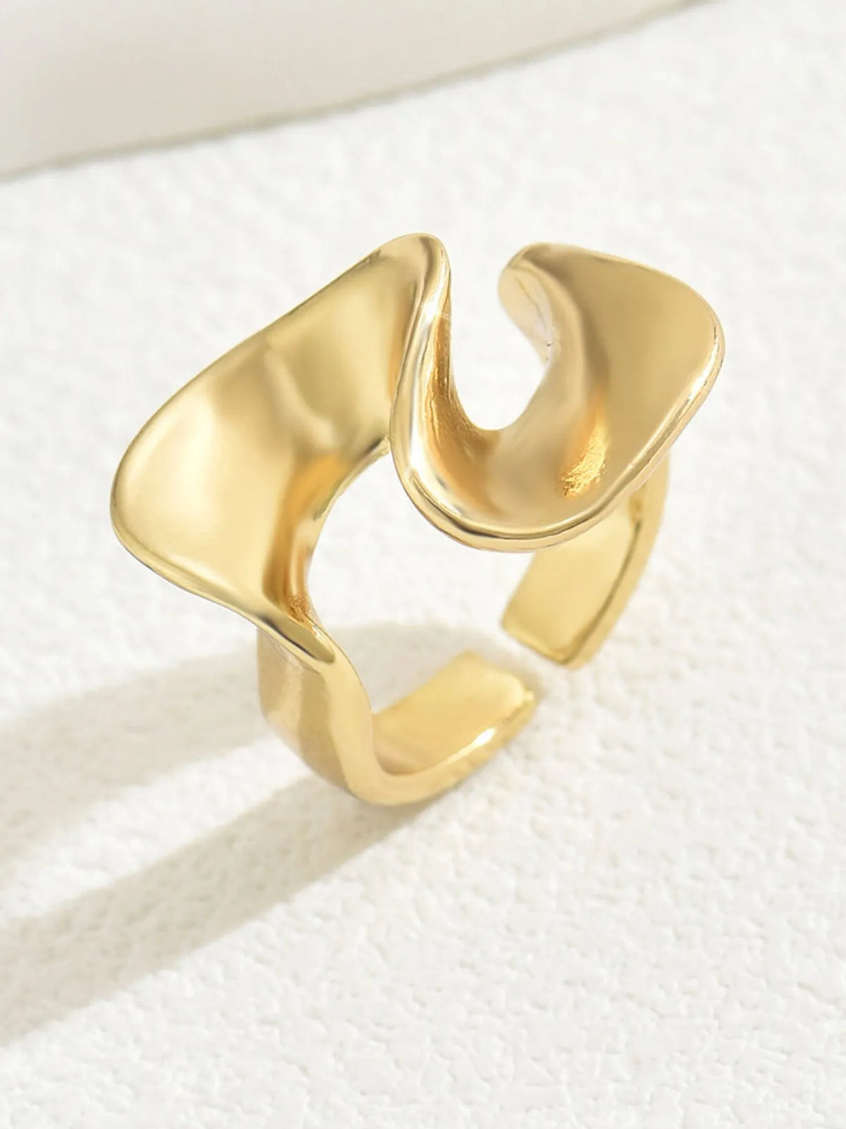 18K gold-plated stainless steel geometric ring with modern angular design, stylish jewelry accessory.